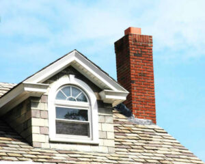 masonry chimney with blue sky